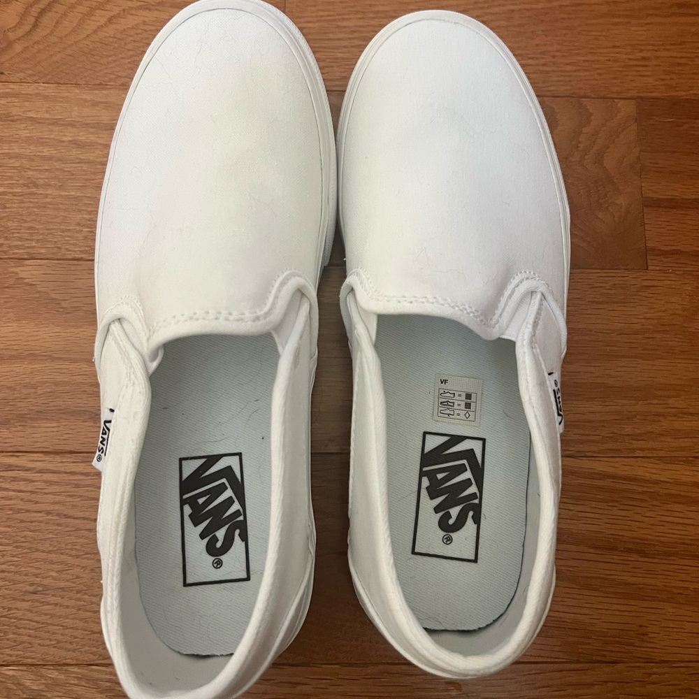 NWOT women’s  slip on vans. Size 8 never worn